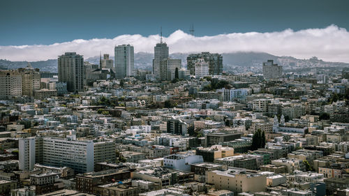 Aerial view of cityscape against sky