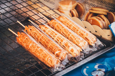 High angle view of meat on barbecue grill