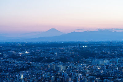 High angle view of townscape against sky during sunset