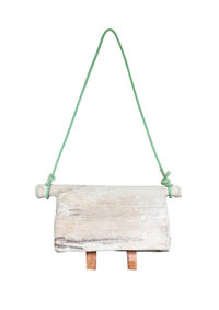 Close-up of rope against white background