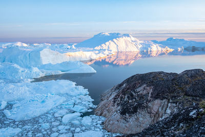 High angle view of ice berg in sea during winter