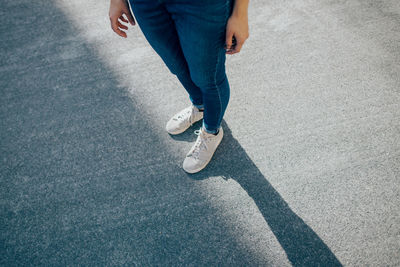 Low section of man standing on floor