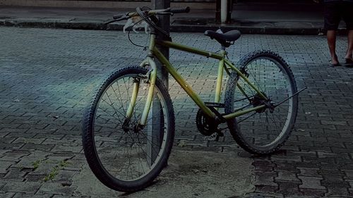 Bicycle parked on street