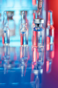 Close-up of wine glasses on table