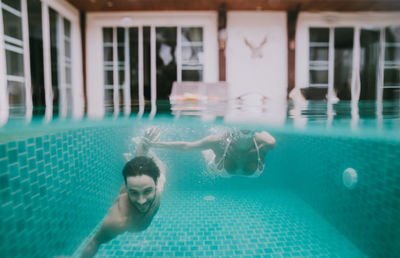 People swimming in pool