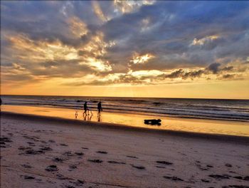 Scenic view of sea at sunset