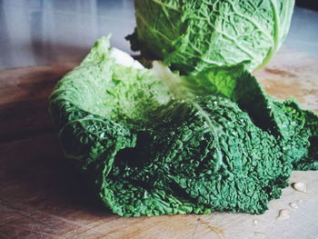 Close-up of savoy cabbage on cutting board