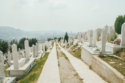 Panoramic view of cemetery against sky