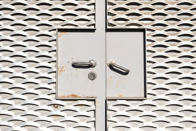 Close-up of metal door handles
