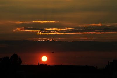 Scenic view of dramatic sky during sunset