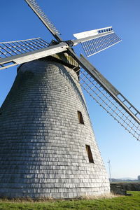 Historical windmill agaagainst blue sky