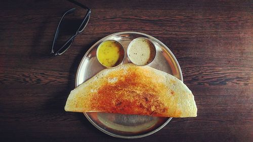 Close-up of bread in plate on table