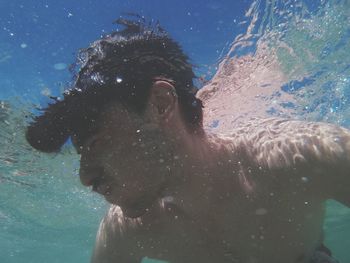 Woman swimming in water