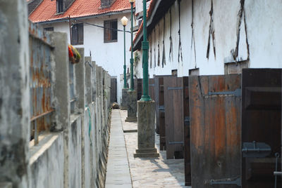 Narrow alley along buildings