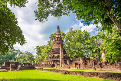 View of temple against building