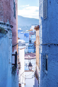 Classic and traditional wall lamp in the corner of a house from chefchaouen