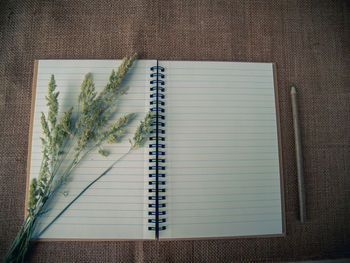 High angle view of open book on table