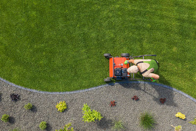 High angle view of tractor on grassy field