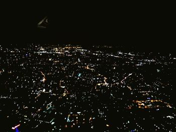 Illuminated cityscape at night