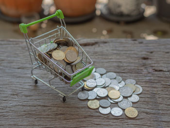 High angle view of coins on table
