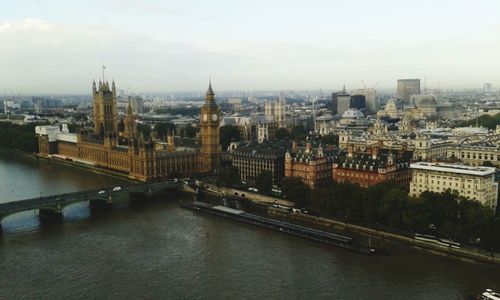 View of bridge over river in city