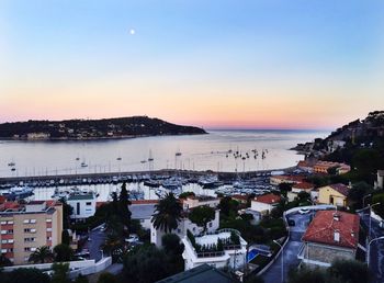 Scenic view of sea against clear sky at sunset