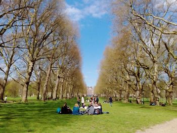 People relaxing in park