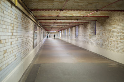 Subway underpass-  long tunnel with people in the way.