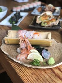 Close-up of sashimi in plate on table