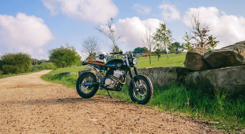 Beautiful vintage custom motorcycle parked on the side of the road