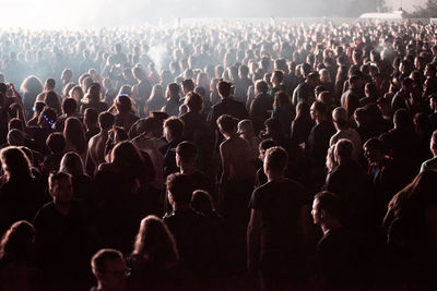 People enjoying at music concert