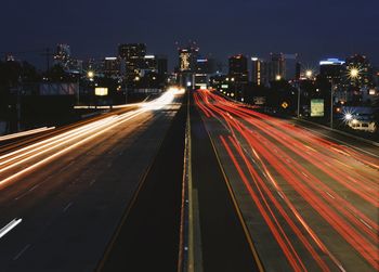 High angle view of light trails on city street