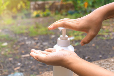 Close-up of person holding hands