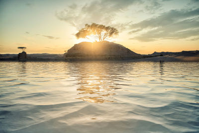 Scenic view of sea against sky during sunset