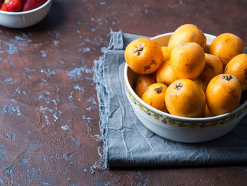 High angle view of fruits in bowl on table