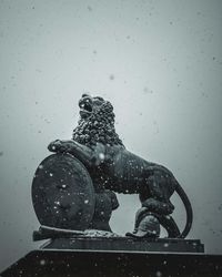 Close-up of a statue against the sky