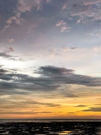 Scenic view of sea against sky at sunset