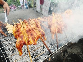 Close-up of meat on barbecue grill