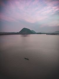 Scenic view of sea against sky at sunset