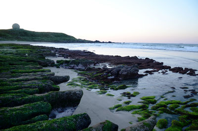 Scenic view of sea against clear sky