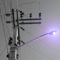 Low angle view of power lines