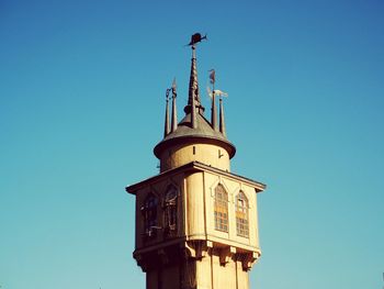 Low angle view of clock tower against sky