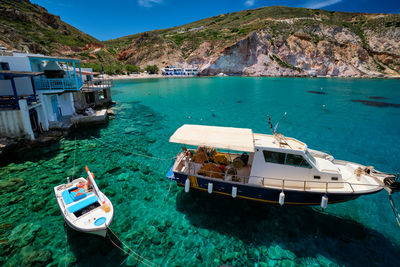 High angle view of sailboats moored on sea