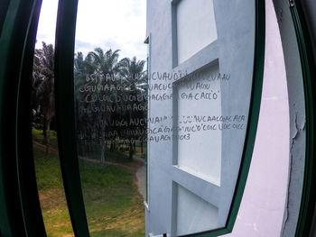 Close-up of text on window