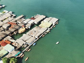 High angle view of commercial dock by sea