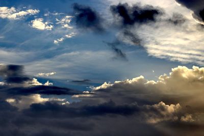 Low angle view of clouds in sky during sunset