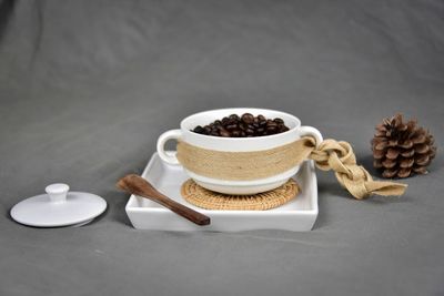 Close-up of coffee cup on table