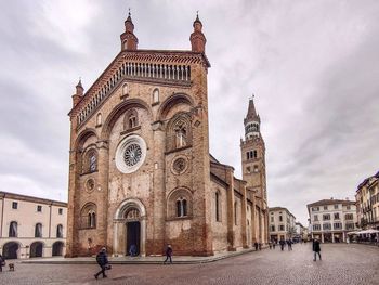 Group of people in front of historic building