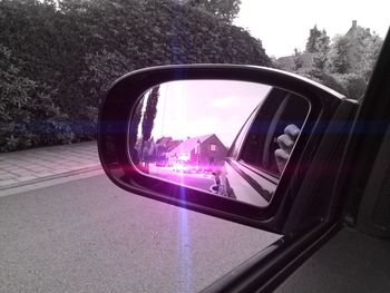 Reflection of car on road