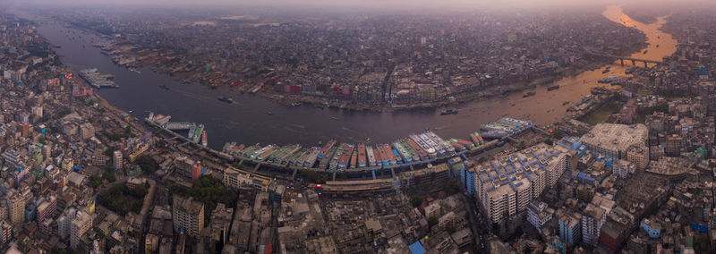 High angle view of crowd river port against buildings